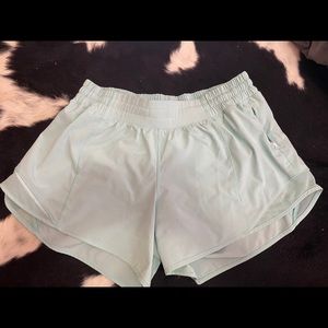 Turquoise Lululemon Hotty Hot shorts